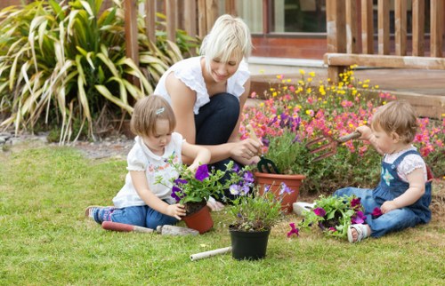 Landscaping team preparing a garden project booking and site assessment